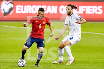 2021-03-31 - Koke of Spain and Vedat Muriqi of Kosovo during the 2022 FIFA World Cup, Qualifiers, Group B football match between Spain and Kosovo on March 31, 2021 at Estadio Olimpico in Seville, Spain - Photo Pablo Morano / Orange Pictures / DPPI - MONDIALI FIFA 2022, QUALIFICAZIONI, GRUPPO B - SPAGNA VS KOSOVO - FIFA WORLD CUP - SOCCER