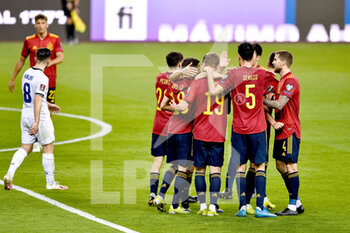 2021-03-31 - Dani Olmo of Spain celebrates after scoring his sides first goal with teammates during the 2022 FIFA World Cup, Qualifiers, Group B football match between Spain and Kosovo on March 31, 2021 at Estadio Olimpico in Seville, Spain - Photo Pablo Morano / Orange Pictures / DPPI - MONDIALI FIFA 2022, QUALIFICAZIONI, GRUPPO B - SPAGNA VS KOSOVO - FIFA WORLD CUP - SOCCER