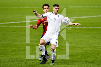 2021-03-31 - Eric Garcia of Spain and Milot Rashica of Kosovo during the 2022 FIFA World Cup, Qualifiers, Group B football match between Spain and Kosovo on March 31, 2021 at Estadio Olimpico in Seville, Spain - Photo Pablo Morano / Orange Pictures / DPPI - MONDIALI FIFA 2022, QUALIFICAZIONI, GRUPPO B - SPAGNA VS KOSOVO - FIFA WORLD CUP - SOCCER