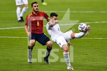 2021-03-31 - Koke of Spain and Besar Halimi of Kosovo during the 2022 FIFA World Cup, Qualifiers, Group B football match between Spain and Kosovo on March 31, 2021 at Estadio Olimpico in Seville, Spain - Photo Pablo Morano / Orange Pictures / DPPI - MONDIALI FIFA 2022, QUALIFICAZIONI, GRUPPO B - SPAGNA VS KOSOVO - FIFA WORLD CUP - SOCCER