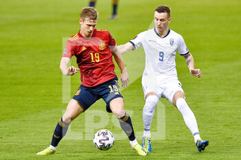 2021-03-31 - Dani Olmo of Spain and Bersant Celina of Kosovo during the 2022 FIFA World Cup, Qualifiers, Group B football match between Spain and Kosovo on March 31, 2021 at Estadio Olimpico in Seville, Spain - Photo Pablo Morano / Orange Pictures / DPPI - MONDIALI FIFA 2022, QUALIFICAZIONI, GRUPPO B - SPAGNA VS KOSOVO - FIFA WORLD CUP - SOCCER
