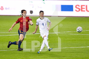 2021-03-31 - Fabian Ruiz of Spain and Bersant Celina of Kosovo during the 2022 FIFA World Cup, Qualifiers, Group B football match between Spain and Kosovo on March 31, 2021 at Estadio Olimpico in Seville, Spain - Photo Pablo Morano / Orange Pictures / DPPI - MONDIALI FIFA 2022, QUALIFICAZIONI, GRUPPO B - SPAGNA VS KOSOVO - FIFA WORLD CUP - SOCCER