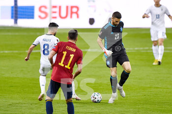 2021-03-31 - Besar Halimi of Kosovo and goalkeeper Unai Simon of Spain during the 2022 FIFA World Cup, Qualifiers, Group B football match between Spain and Kosovo on March 31, 2021 at Estadio Olimpico in Seville, Spain - Photo Pablo Morano / Orange Pictures / DPPI - MONDIALI FIFA 2022, QUALIFICAZIONI, GRUPPO B - SPAGNA VS KOSOVO - FIFA WORLD CUP - SOCCER