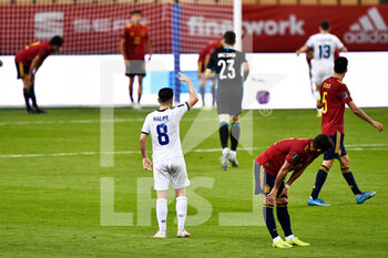 2021-03-31 - Besar Halimi of Kosovo celebrates after scoring his sides first goal during the 2022 FIFA World Cup, Qualifiers, Group B football match between Spain and Kosovo on March 31, 2021 at Estadio Olimpico in Seville, Spain - Photo Pablo Morano / Orange Pictures / DPPI - MONDIALI FIFA 2022, QUALIFICAZIONI, GRUPPO B - SPAGNA VS KOSOVO - FIFA WORLD CUP - SOCCER