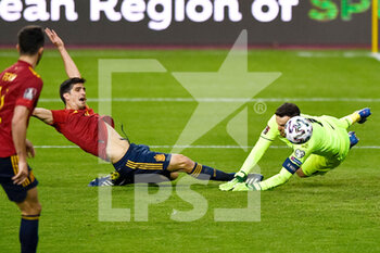 2021-03-31 - Gerard of Spain and goalkeeper Samir Ujkani of Kosovo during the 2022 FIFA World Cup, Qualifiers, Group B football match between Spain and Kosovo on March 31, 2021 at Estadio Olimpico in Seville, Spain - Photo Pablo Morano / Orange Pictures / DPPI - MONDIALI FIFA 2022, QUALIFICAZIONI, GRUPPO B - SPAGNA VS KOSOVO - FIFA WORLD CUP - SOCCER