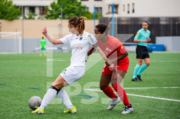 2021-05-01 - Gaetane Thiney of Paris FC and Kayla Mills of GPSO 92 Issy fight for the ball during the Women's French championship D1 Arkema football match between GPSO 92 Issy and Paris FC on May 1, 2021 at Le Gallo stadium in Boulogne-Billancourt, France - Photo Antoine Massinon / A2M Sport Consulting / DPPI - GPSO 92 ISSY VS PARIS FC - FRENCH WOMEN DIVISION 1 - SOCCER
