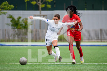 2021-05-01 - Tess Laplacette of Paris FC and Esther Mbakem Niaro of GPSO 92 Issy fight for the ball during the Women's French championship D1 Arkema football match between GPSO 92 Issy and Paris FC on May 1, 2021 at Le Gallo stadium in Boulogne-Billancourt, France - Photo Antoine Massinon / A2M Sport Consulting / DPPI - GPSO 92 ISSY VS PARIS FC - FRENCH WOMEN DIVISION 1 - SOCCER