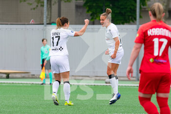 2021-05-01 - Thea Greboval of Paris FC celebrates after scoring with Gaetane Thiney of Paris FC during the Women's French championship D1 Arkema football match between GPSO 92 Issy and Paris FC on May 1, 2021 at Le Gallo stadium in Boulogne-Billancourt, France - Photo Melanie Laurent / A2M Sport Consulting / DPPI - GPSO 92 ISSY VS PARIS FC - FRENCH WOMEN DIVISION 1 - SOCCER