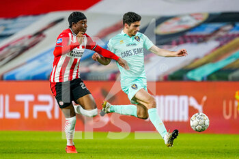 2020-11-01 - Noni Madueke of PSV Eindhoven, Pascu of ADO Den Haag during the Netherlands championship Eredivisie football match between PSV and ADO Den Haag on November 01, 2020 at the Philips stadium in Eindhoven, Netherlands - Photo Jeroen Meuwsen / Orange Pictures / DPPI - PSV AND ADO DEN HAAG - NETHERLANDS EREDIVISIE - SOCCER
