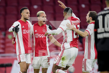 2021-01-10 - Antony of Ajax celebrates after his goal with teammates during the Netherlands championship Eredivisie football match between Ajax and PSV on January 10, 2021 at Johan Cruijff Arena in Amsterdam, Netherlands - Photo Gerrit van Keulen / Orange Pictures / DPPI - AJAX VS PSV - NETHERLANDS EREDIVISIE - SOCCER
