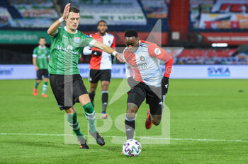 2021-01-13 - Thomas Lam of PEC Zwolle, Lutsharel Geertruida of Feyenoord during the Netherlands championship Eredivisie football match between Feyenoord and PEC Zwolle on January 13, 2021 at De Kuip in Rotterdam, Netherlands - Photo Marcel ter Bals / Orange Pictures / DPPI - FEYENOORD VS PEC ZWOLLE - NETHERLANDS EREDIVISIE - SOCCER