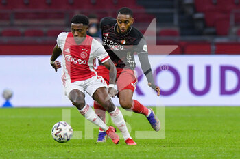 2021-01-17 - Quincy Promes of Ajax, Leroy Fer of Feyenoord during the Netherlands championship Eredivisie football match between Ajax and Feyenoord on January 17, 2021 at Johan Cruijff Arena in Amsterdam, Netherlands - Photo Yannick Verhoeven / Orange Pictures / DPPI - AJAX AND FEYENOORD - NETHERLANDS EREDIVISIE - SOCCER