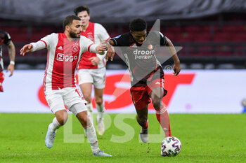 2021-01-17 - Zakaria Labyad of Ajax, Tyrell Malacia of Feyenoord during the Netherlands championship Eredivisie football match between Ajax and Feyenoord on January 17, 2021 at Johan Cruijff Arena in Amsterdam, Netherlands - Photo Yannick Verhoeven / Orange Pictures / DPPI - AJAX AND FEYENOORD - NETHERLANDS EREDIVISIE - SOCCER