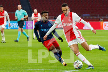 2021-01-28 - Che Nunnely of Willem II, Noussair Mazraoui of Ajax during the Netherlands championship Eredivisie football match between Ajax and Willem II on January 28, 2021 at Johan Cruijff Arena in Amsterdam, Netherlands - Photo Geert van Erven / Orange Pictures / DPPI - AJAX AND WILLEM II - NETHERLANDS EREDIVISIE - SOCCER