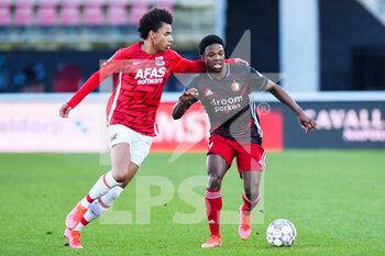 2021-02-28 - Calvin Stengs of AZ and Tyrell Malacia of Feyenoord during the Netherlands championship Eredivisie football match between AZ and Feyenoord on February 28, 2021 at AFAS Stadion in Alkmaar, Netherlands - Photo Yannick Verhoeven / Orange Pictures / DPPI - AZ AND FEYENOORD - NETHERLANDS EREDIVISIE - SOCCER
