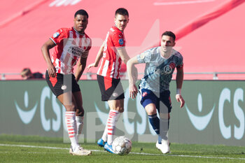 2021-02-28 - Denzel Dumfries of PSV, Ryan Thomas of PSV and Dusan Tadic of Ajax during the Netherlands championship Eredivisie football match between PSV and Ajax on February 28, 2021 at Philips Stadion in Eindhoven, Netherlands - Photo Perry vd Leuvert / Orange Pictures / DPPI - PSV AND AJAX - NETHERLANDS EREDIVISIE - SOCCER