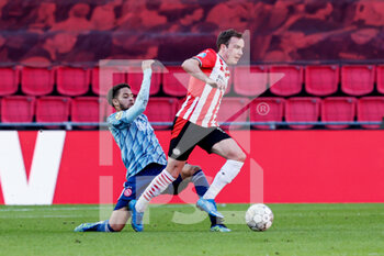 2021-02-28 - Devyne Rensch of Ajax and Mario Gotze of PSV during the Netherlands championship Eredivisie football match between PSV and Ajax on February 28, 2021 at Philips Stadion in Eindhoven, Netherlands - Photo Perry vd Leuvert / Orange Pictures / DPPI - PSV AND AJAX - NETHERLANDS EREDIVISIE - SOCCER