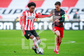 2021-03-14 - Pablo Rosario of PSV Eindhoven and Steven Berghuis of Feyenoord during the Netherlands championship Eredivisie football match between PSV and Feyenoord on March 14, 2021 at Philips Stadion in Eindhoven, Netherlands - Photo Broer van den Boom / Orange Pictures / DPPI - PSV AND FEYENOORD - NETHERLANDS EREDIVISIE - SOCCER
