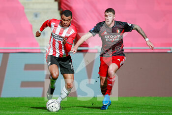 2021-03-14 - Cody Gakpo of PSV Eindhoven and Marcos Senesi of Feyenoord during the Netherlands championship Eredivisie football match between PSV and Feyenoord on March 14, 2021 at Philips Stadion in Eindhoven, Netherlands - Photo Broer van den Boom / Orange Pictures / DPPI - PSV AND FEYENOORD - NETHERLANDS EREDIVISIE - SOCCER