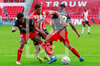 2021-03-14 - Tyrell Malacia of Feyenoord, Denzel Dumfries of PSV Eindhoven and Luis Sinisterra of Feyenoord during the Netherlands championship Eredivisie football match between PSV and Feyenoord on March 14, 2021 at Philips Stadion in Eindhoven, Netherlands - Photo Broer van den Boom / Orange Pictures / DPPI - PSV AND FEYENOORD - NETHERLANDS EREDIVISIE - SOCCER