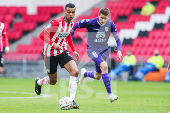 04/04/2021 - Cody Gakpo of PSV Eindhoven, Lucas Schoofs of Heracles Almelo during the Netherlands championship Eredivisie football match between PSV and Heracles Almelo on April 4, 2021 at Philips Stadion in Eindhoven, Netherlands - Photo Perry van de Leuvert / Orange Pictures / DPPI - PSV VS HERACLES ALMELO - NETHERLANDS EREDIVISIE - CALCIO