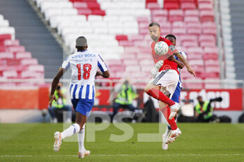 2021-05-06 - Haris Seferovic of Benfica and Chancel Mbemba of Porto during the Portuguese championship Liga NOS football match between SL Benfica and FC Porto on May 6, 2021 at Estadio da Luz in Benfica, Portugal - Photo Joao Rico / ProSportsImages / DPPI - SL BENFICA VS FC PORTO - PORTUGUESE PRIMEIRA LIGA - SOCCER