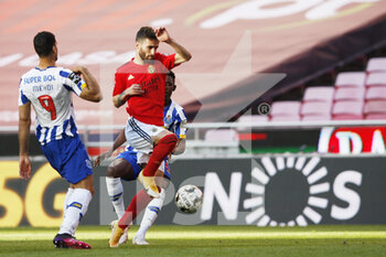 2021-05-06 - Rafa Silva of Benfica and Mehdi Taremi of Porto during the Portuguese championship Liga NOS football match between SL Benfica and FC Porto on May 6, 2021 at Estadio da Luz in Benfica, Portugal - Photo Joao Rico / ProSportsImages / DPPI - SL BENFICA VS FC PORTO - PORTUGUESE PRIMEIRA LIGA - SOCCER