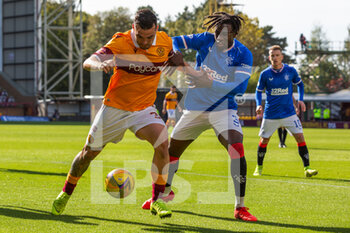 2020-09-27 - Tony Watt (Motherwell) keeps possession from Calvin Bassey (Rangers) during the Scottish championship, Premiership football match between Motherwell and Rangers on September 27, 2020 at Fir Park in Motherwell, Scotland - Photo Chris McCluskie / ProSportsImages / DPPI - MOTHERWELL VS RANGERS - SCOTTISH PREMIERSHIP - SOCCER