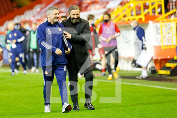 2020-10-02 - Aberdeen Manager Derek McInnes and Aberdeen Assistant Manager Tony Doherty leave the pitch after the Scottish championship Premiership football match between Aberdeen and St Mirren on October 2, 2020 at Pittodrie Stadium in Aberdeen, Scotland - Photo Stephen Dobson / ProSportsImages / DPPI - ABERDEEN VS ST MIRREN - SCOTTISH PREMIERSHIP - SOCCER