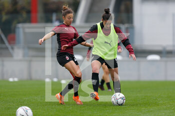 2020-11-15 - Laura Fusetti (AC Milan) and Linda Tucceri Cimini (AC Milan) warming up before the match - AC MILAN VS AS ROMA - ITALIAN SERIE A WOMEN - SOCCER