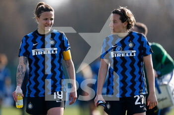2021-03-07 - Lisa Alborghetti (FC Internazionale) and Stefania Tarenzi (FC Internazionale) leaving the pitch after the end of the game - FC INTERNAZIONALE VS NAPOLI FEMMINILE - ITALIAN SERIE A WOMEN - SOCCER