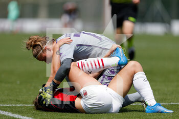 2021-05-09 - Katja Schroffenegger (ACF Fiorentina Femminile) checking on Francesca Vitale (AC Milan) after a foul - AC MILAN VS ACF FIORENTINA FEMMINILE - ITALIAN SERIE A WOMEN - SOCCER