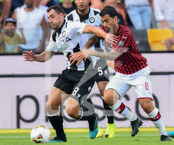 2019-08-25 - Mato Jajalo dell’Udinese è contrastato da Fernandez Jesus Suso del Milan. - UDINESE VS MILAN - ITALIAN SERIE A - SOCCER