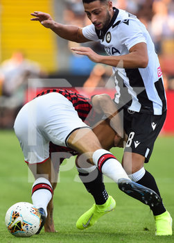 2019-08-25 - Ricardo Rodriguez del Milan contrastato da Rolando Mandragora dell’Udinese. - UDINESE VS MILAN - ITALIAN SERIE A - SOCCER