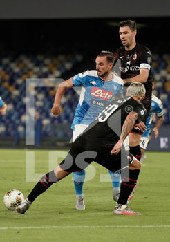 2020-07-12 - Fabian Ruiz (C) of Napoli and Theo Hernandez and Alessio Romagnoli of Milan compete for the ball in action during match Serie A TIM between SSC Napoli and AC Milan on July 12 2020 in Naples (Italy) at San Paolo Stadium Photo LPS/MARCO IORIO - NAPOLI VS MILAN - ITALIAN SERIE A - SOCCER