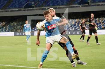2020-07-12 - Theo Hernandez of Milan and Giovanni Di Lorenzo in action during match Serie A TIM between SSC Napoli and AC Milan on July 12,2020 in Naples (Italy) at San Paolo Stadium Photo LPS/MARCO IORIO - NAPOLI VS MILAN - ITALIAN SERIE A - SOCCER