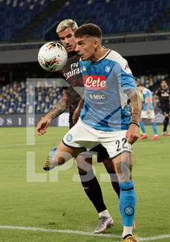 2020-07-12 - Giovanni Di Lorenzo (22) of Napoli and Theo Hernandez of Milan compete for the ball during match Serie A TIM between SSC Napoli and AC Milan on July 12 2020 in Naples (Italy) at San Paolo Stadium Photo LPS/MARCO IORIO - NAPOLI VS MILAN - ITALIAN SERIE A - SOCCER