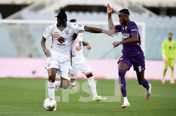 2020-07-19 - Soualiho Meite' of Torino FC in action against Christian Kouame of ACF Fiorentina  - FIORENTINA VS TORINO - ITALIAN SERIE A - SOCCER
