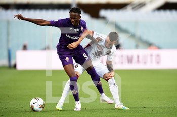 2020-07-19 - Christian Kouame of ACF Fiorentina in action against Alejandro Berenguer of Torino FC - FIORENTINA VS TORINO - ITALIAN SERIE A - SOCCER