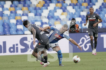 2020-07-19 - NAPOLI-ITALY JULY 2020,19 Rodrigo Javier De Paul (L) of Udinese and Kalidou Koulibaly Stanislav Lobotka of Napoli in action during the match Serie A TIM between SSC Napoli and Udinese on July 19,2020 in Naples (Italy) at San Paolo Stadium Photo LPS/MARCO IORIO - NAPOLI VS UDINESE - ITALIAN SERIE A - SOCCER
