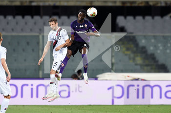 2020-07-29 - Christian Kouame (Fiorentina) e Gabriele Corbo (Bologna) - FIORENTINA VS BOLOGNA - ITALIAN SERIE A - SOCCER