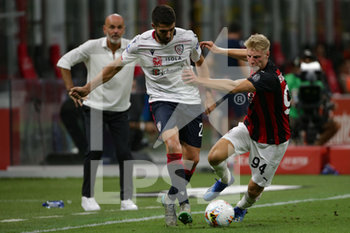 2020-08-01 - Paolo Faragò (Cagliari) and Marco Brescianini (Milan) - MILAN VS CAGLIARI - ITALIAN SERIE A - SOCCER