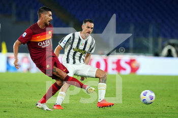 2020-09-27 - Lorenzo Pellegrini of Roma (L) and Aaron Ramsey of Juventus in action during the Italian championship Serie A football match between AS Roma and Juventus FC on September 27, 2020 at Stadio Olimpico in Rome, Italy - Photo Federico Proietti / DPPI - AS ROMA VS JUVENTUS FC - ITALIAN SERIE A - SOCCER