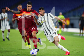 2020-09-27 - Gianluca Mancini of Roma (L) vies for the ball with Gianluca Frabotta of Juventus (R) during the Italian championship Serie A football match between AS Roma and Juventus FC on September 27, 2020 at Stadio Olimpico in Rome, Italy - Photo Federico Proietti / DPPI - AS ROMA VS JUVENTUS FC - ITALIAN SERIE A - SOCCER