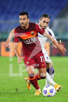 2020-11-01 - Pedro Rodriguez of Roma (L) vies for the ball with Martin Caceres of Fiorentina (R) during the Italian championship Serie A football match between AS Roma and ACF Fiorentina on November 1, 2020 at Stadio Olimpico in Rome, Italy - Photo Federico Proietti / DPPI - AS ROMA AND ACF FIORENTINA - ITALIAN SERIE A - SOCCER