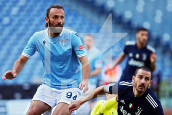 2020-11-08 - Vedat Muriqi of Lazio in action with Leonardo Bonucci of Juventus (R) during the Italian championship Serie A football match between SS Lazio and Juventus FC on November 8, 2020 at Stadio Olimpico in Rome, Italy - Photo Federico Proietti / DPPI - SS LAZIO VS JUVENTUS FC - ITALIAN SERIE A - SOCCER