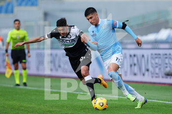 2020-11-29 - Joaquin Correa of Lazio (R) vies for the ball with Nahuel Molina of Udinese (L) during the Italian championship Serie A football match between SS Lazio and Udinese Calcio on November 29, 2020 at Stadio Olimpico in Rome, Italy - Photo Federico Proietti / DPPI - SS LAZIO VS UDINESE CALCIO - ITALIAN SERIE A - SOCCER
