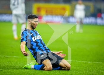 2020-12-05 - Achraf Hakimi of FC Internazionale celebrates the goal during the Serie A 2020/21 football match between FC Internazionale vs Bologna FC at the San Siro Stadium, Milan, Italy on December 05, 2020 - Photo FCI / Fabrizio Carabelli - INTER VS BOLOGNA - ITALIAN SERIE A - SOCCER