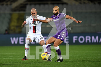 2020-12-07 - Sofyan Amrabat (ACF Fiorentina) in azione contrastato da Steafano Sturaro (Genoa CFC) - FIORENTINA VS GENOA - ITALIAN SERIE A - SOCCER