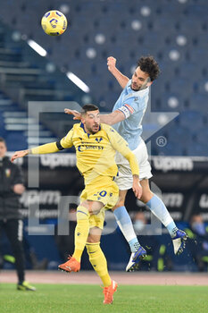 2020-12-12 - ROME, ITALY - December 12 Mattia Zaccagni (L) of Hellas Verona in action against  Marco Parolo (R) of Lazio during the Serie A soccer match between SS Lazio and Hellas Verona Stadio Olimpico on December 12,2020 in Rome Italy   - SS LAZIO VS HELLAS VERONA - ITALIAN SERIE A - SOCCER